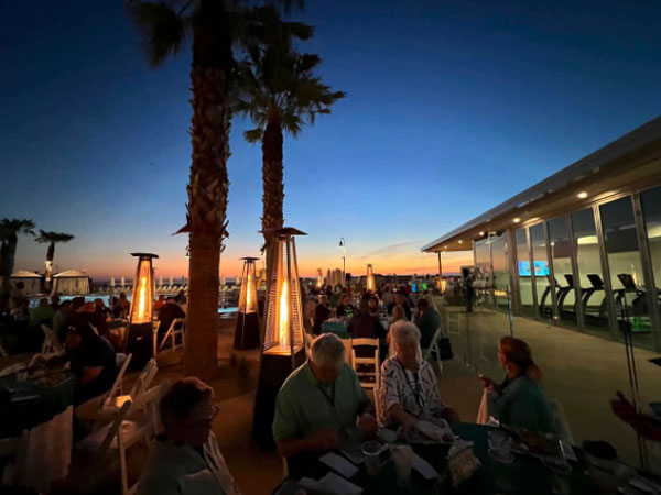 dining pool deck at sunset